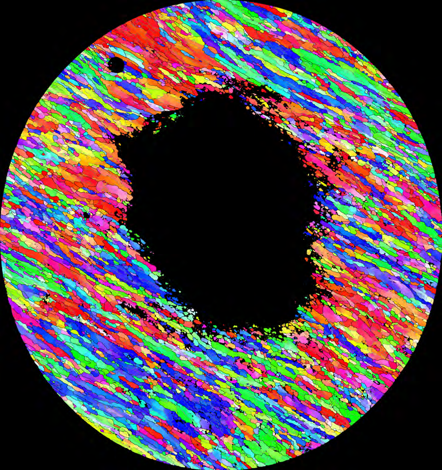 Fig. 2a. Pattern quality map of an ECAP deformed Al-Mg-Cu alloy. Fig. 2b. Orientation map of the same area, with high angle boundaries in black, low angle boundaries in grey.